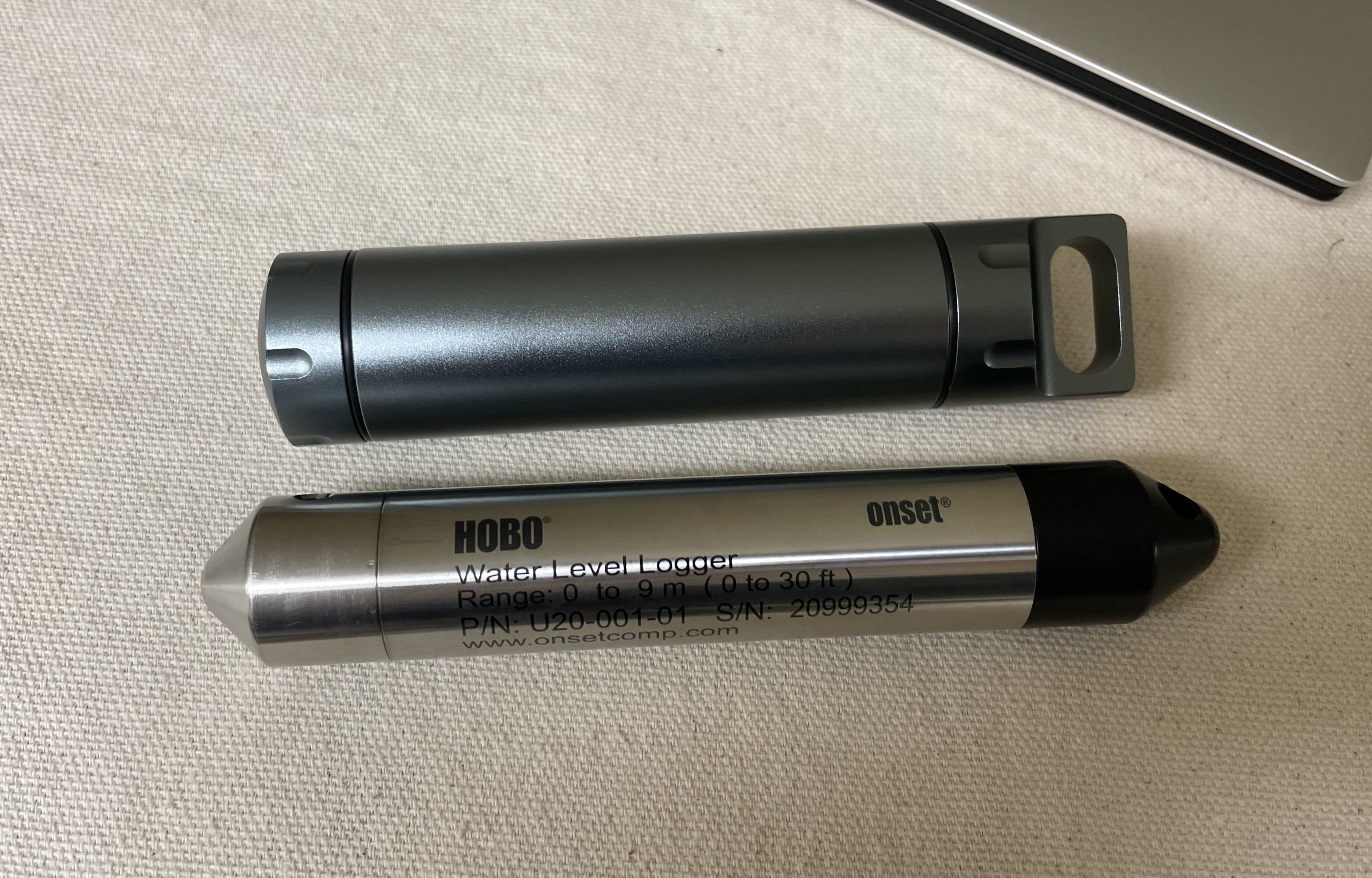 MISO enclosure next to comparable Onset sensor